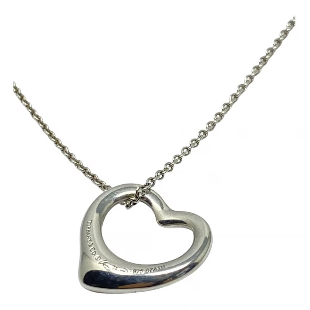 Tiffany & Co Open Heart Necklace.
Mattel: Sterling Sliver 925
